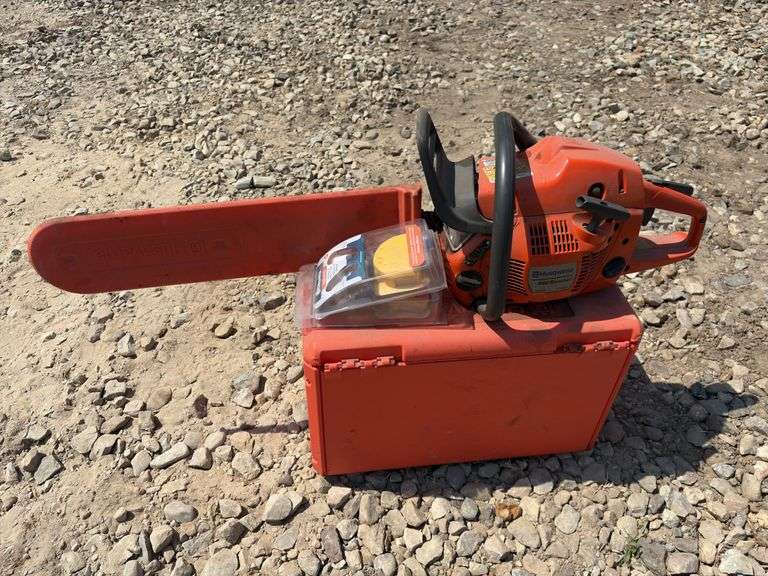 Husqvarna 460 rancher chainsaw w/ case & (2) tune up kits