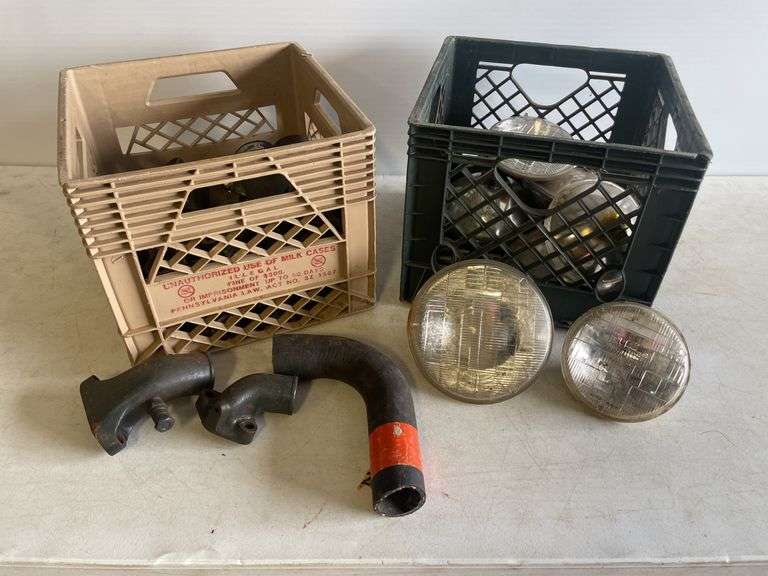 Vintage headlights and exhaust manifolds and pipes