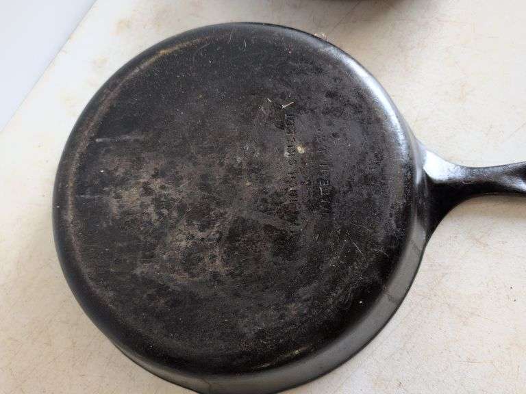 (2) cast iron skillets