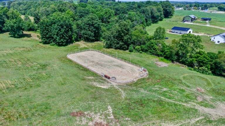 Parcel 2: 20.9 Acres with Riding Arena and Building Site.