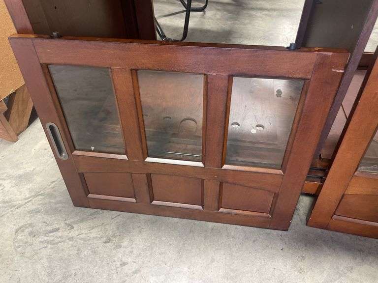 Wooden TV stand with glass doors