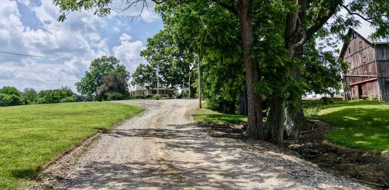 Parcel 1: 9.4 Acres with Farmstead, Pond and Cabin.