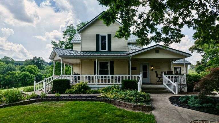 Parcel 1: 9.4 Acres with Farmstead, Pond and Cabin.