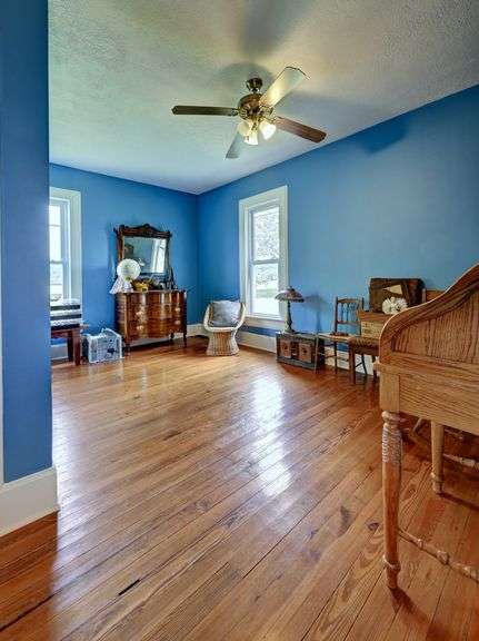 Parcel 1: 9.4 Acres with Farmstead, Pond and Cabin.
