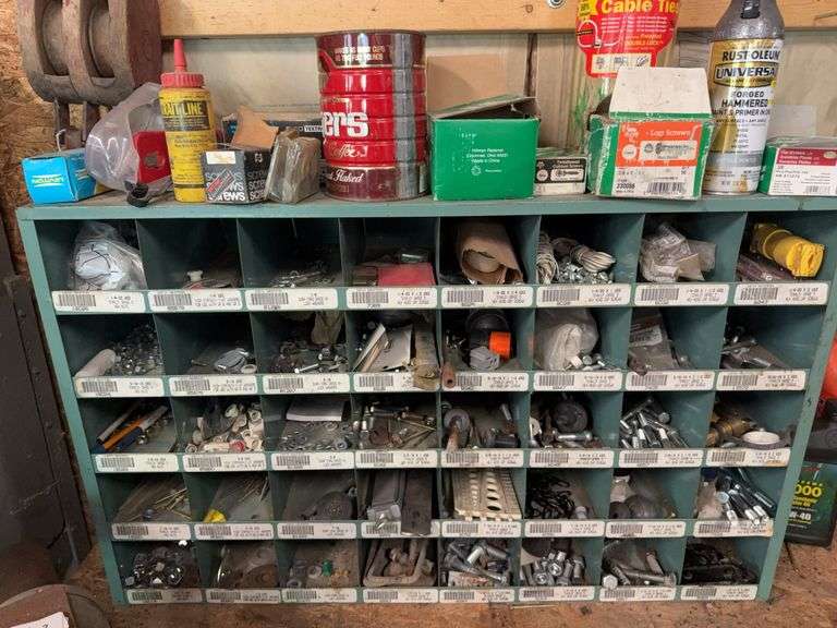 PARTS BIN WITH PARTS IN AND ON TOP
