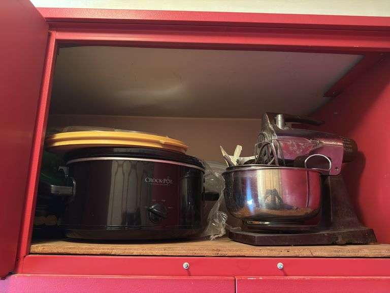 CONTENTS OF UPPER RED CABINETS INCL. CROCKPOT, VINTAGE MIXER, BOWLS ETC.