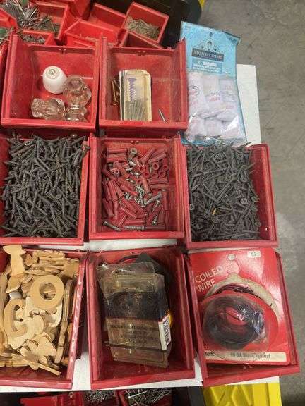 Tote of screws, woodworking supplies, and hardware