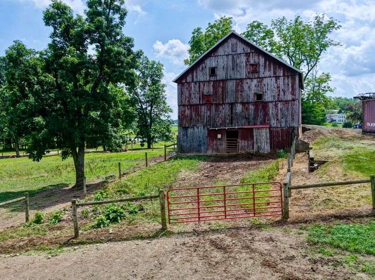 Parcel 1: 9.4 Acres with Farmstead, Pond and Cabin.