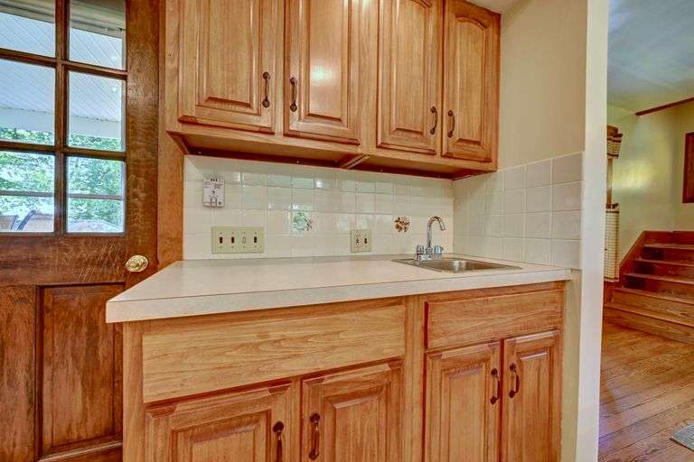 Parcel 1: 9.4 Acres with Farmstead, Pond and Cabin.