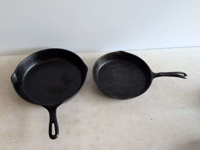 (2) cast iron skillets