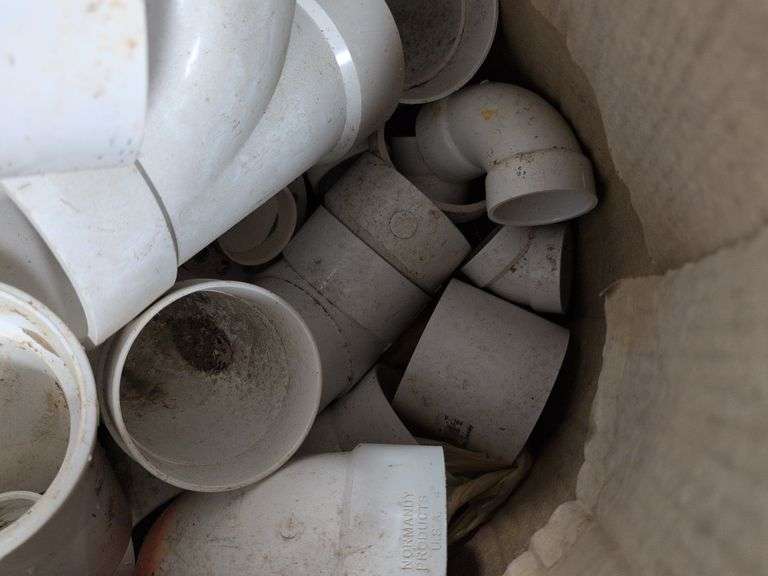 Assortment of PVC pipe fittings