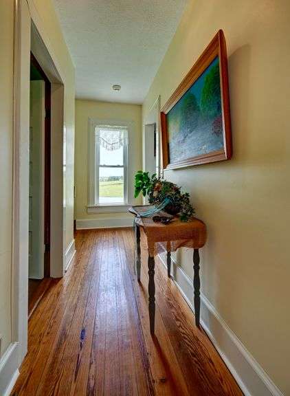 Parcel 1: 9.4 Acres with Farmstead, Pond and Cabin.