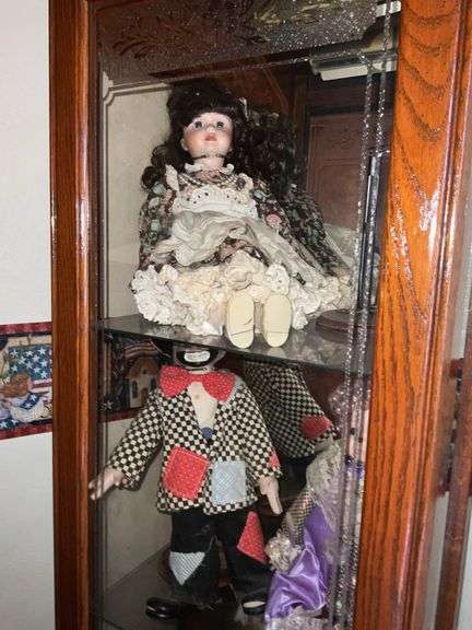 BOOKSHELF AND GLASS SHOWCASE W/ALL DOLLS. BLANKETS, AND FABRIC REMNANTS