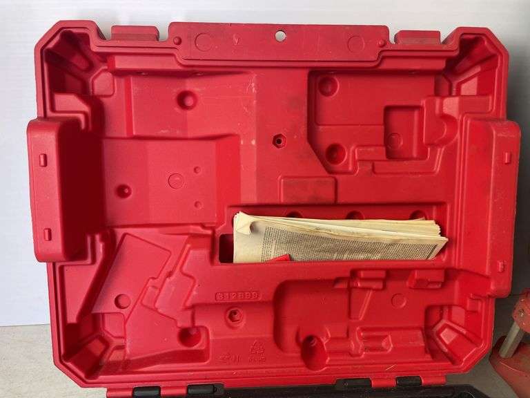Milwaukee pack out and tool box with drill, impact, battery and charger