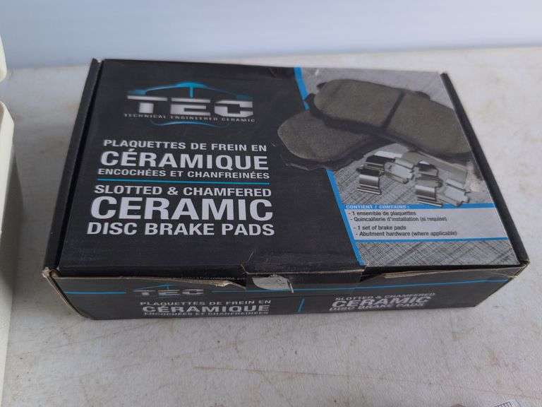 Dymo label maker kit, rolling ruler, and ceramic disc brake pads