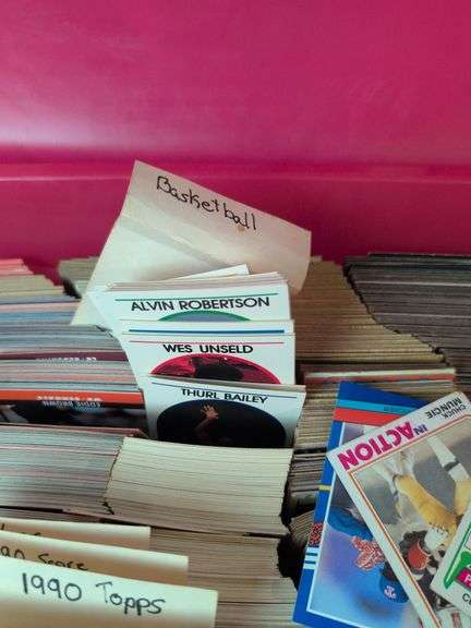 Tote full of 80s and 90s baseball, football, and basketball cards