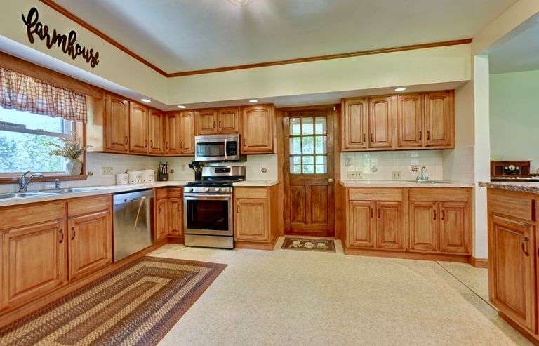 Parcel 1: 9.4 Acres with Farmstead, Pond and Cabin.