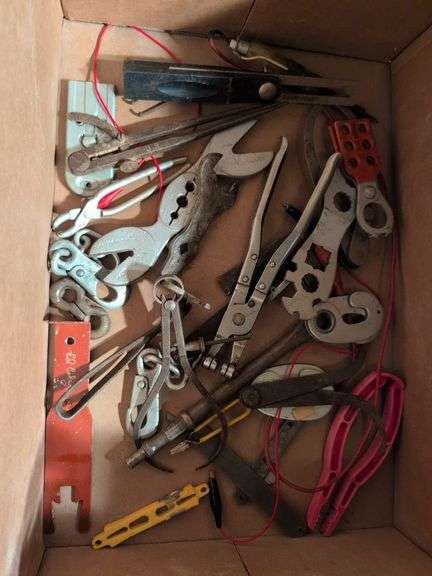 Miscellaneous tools and hardware - gas can, clamps, scythe, railroad nails, hacksaw blades, and more