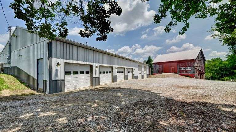 Parcel 1: 9.4 Acres with Farmstead, Pond and Cabin.