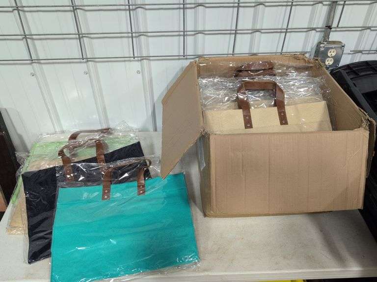 Box of brand new purses