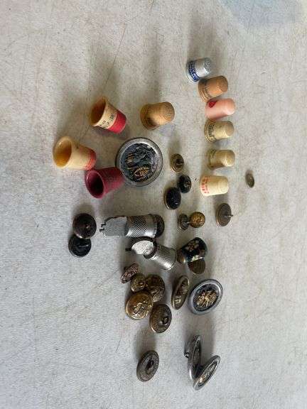 Vintage thimbles and decorative buttons