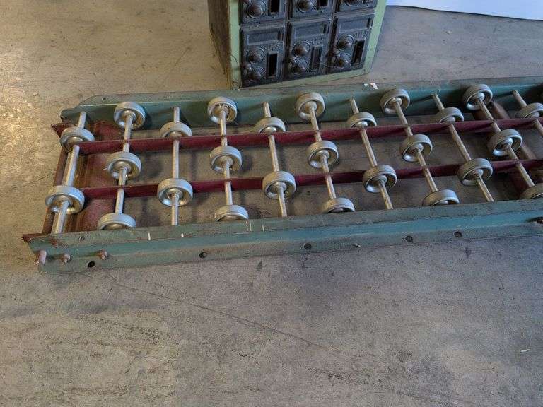 Vintage post office boxes and antique conveyor rollers