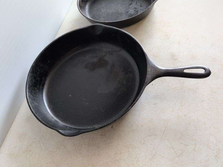 (2) cast iron skillets