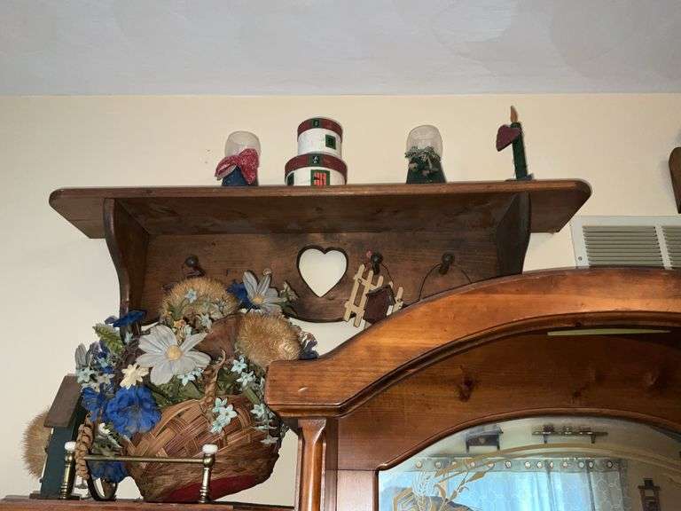 WOODEN SHELVES AND RUSTIC DECOR ON WALL
