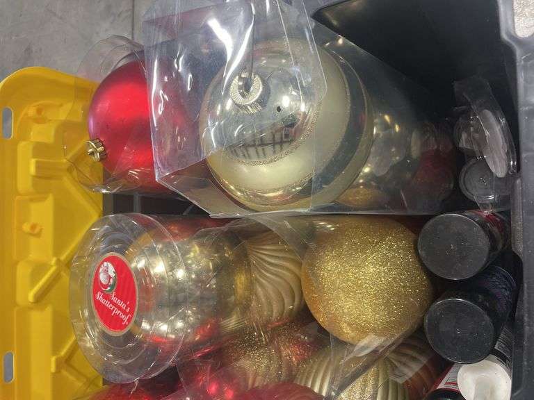 Tote of Christmas lights and decorative bulbs