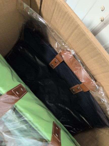 Box of brand new purses