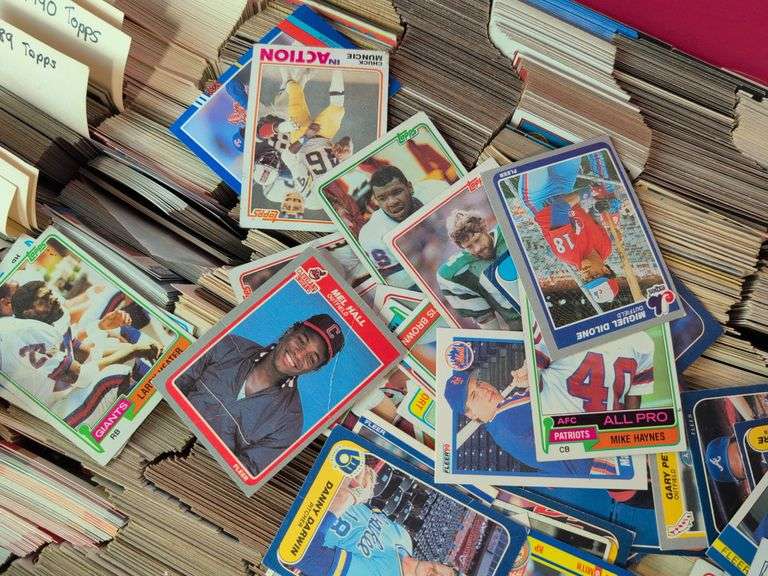 Tote full of 80s and 90s baseball, football, and basketball cards