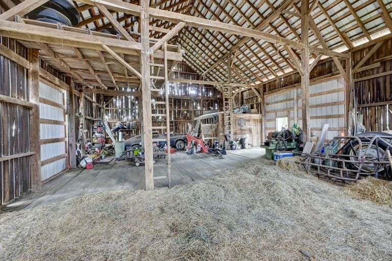 Parcel 1: 9.4 Acres with Farmstead, Pond and Cabin.