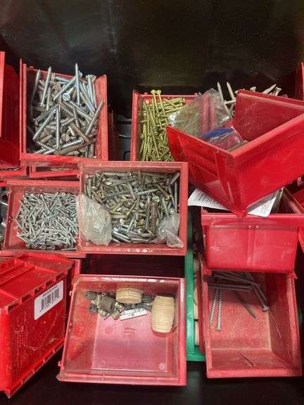 Tote of screws, woodworking supplies, and hardware