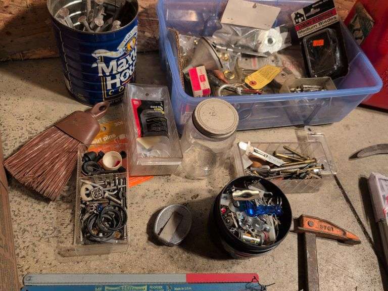 Miscellaneous tools and hardware - gas can, clamps, scythe, railroad nails, hacksaw blades, and more