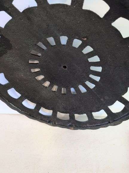 Large cast iron decorative piece and t-handled tool