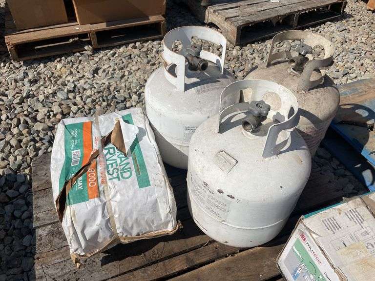 (3) propane tanks and baler twine
