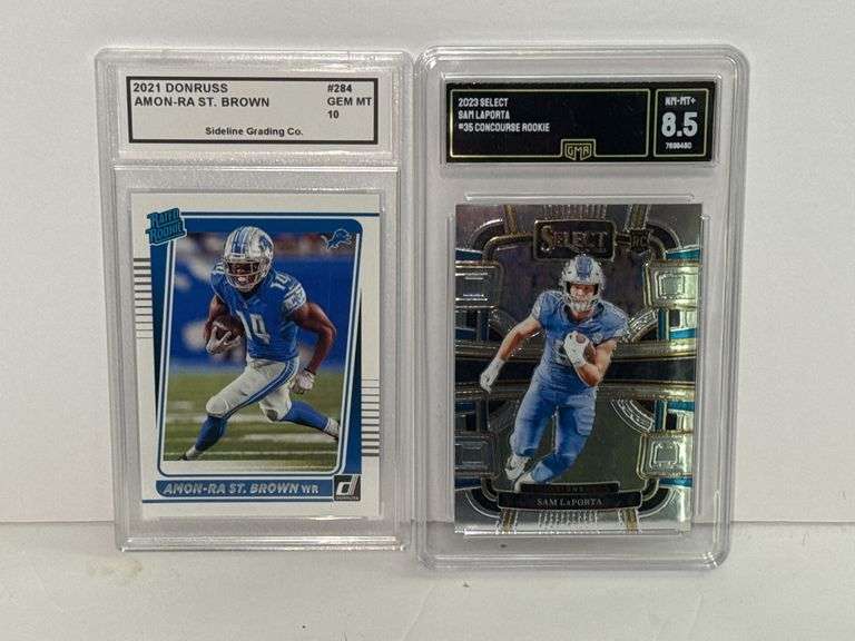 2021 Donruss Rated Rooke Amon-Ra St. Brown (SGC 10) and 2023 Select Sam LaPorta Concourse Rookie (GM