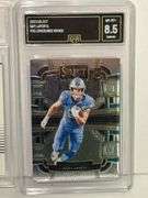 2021 Donruss Rated Rooke Amon-Ra St. Brown (SGC 10) and 2023 Select Sam LaPorta Concourse Rookie (GM