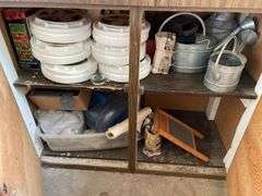 CONTENTS INCLUDING HUMMEL DECOR PLATES, VINTAGE WATERING CANS AND MORE