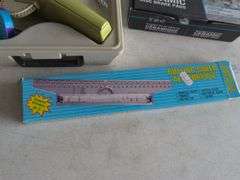 Dymo label maker kit, rolling ruler, and ceramic disc brake pads