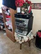 WOOD CABINET W/SPEAKERS AND SHELF OF DVD'S/CD'S