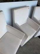 (4) matching white chairs on wheels