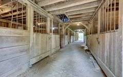 Parcel 1: 9.4 Acres with Farmstead, Pond and Cabin.