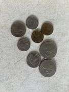 (2) Eisenhower dollar coins, (2) Kennedy half dollars, (2) Susan B. Anthony dollar coins, and (2) Sa