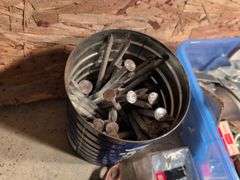 Miscellaneous tools and hardware - gas can, clamps, scythe, railroad nails, hacksaw blades, and more