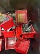 Tote of screws, woodworking supplies, and hardware