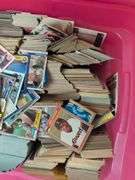 Tote full of 80s and 90s baseball, football, and basketball cards