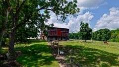Parcel 1: 9.4 Acres with Farmstead, Pond and Cabin.