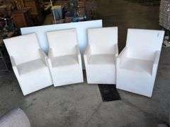 (4) matching white chairs on wheels