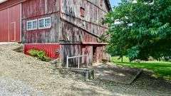 Parcel 1: 9.4 Acres with Farmstead, Pond and Cabin.